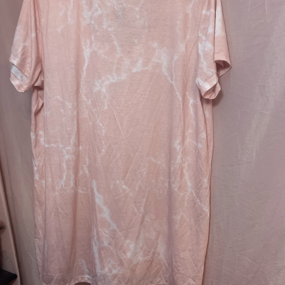 A tee shirt never worn I just took the tags off